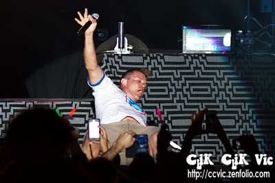 Photo of Ashley Buchholz with USS in concert at the CNE Bandshell. Photo credit ccvic.zenfolio.com