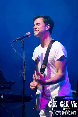 Photo of Dan Kurtz on Bass with Dragonette performing at the CNE Bandshell. Photo credit Vincent Banial