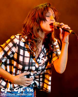 Photo of Martina Sorbara performing with Dragonette at the CNE Bandshell. Photo credit Vincent Banial