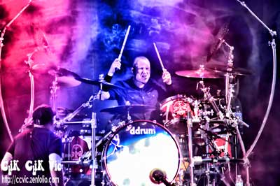 Photo of Joey Dandeneau on Drums with Theory of a Deadman performing at the CNE Bandshell. Photo credit Vincent Banial