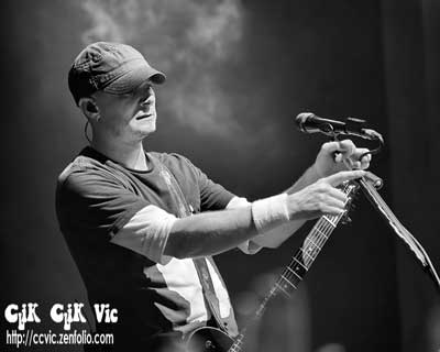 Photo of David Brenner on Guitar with Theory of a Deadman performing at the CNE Bandshell. Photo credit ccvic.zenfolio.com