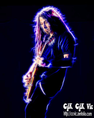 Photo of Michael Staertow, a Master of the Guitar. Playing with Lou Gramm, summer of 2013 in Toronto. Photo credit http://ccvic.zenfolio.com