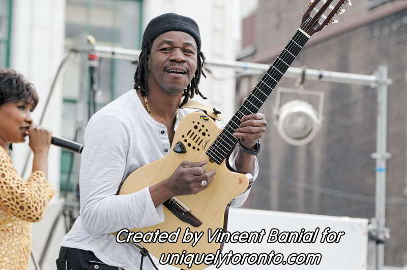 Photo of Katenan Dioubate - CHEKA performing at Yonge Dundas Square in Toronto on May 25 2015. Photo credit Vincent Banial