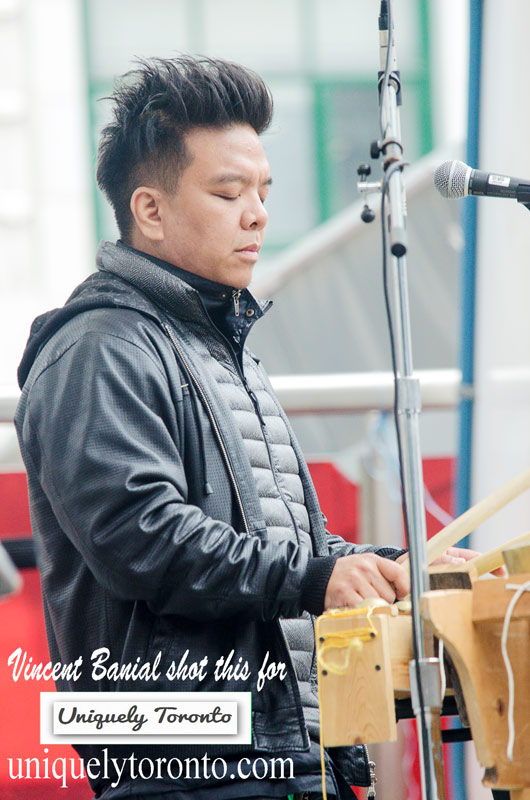 Photo of DATU performing at Yonge Dundas Square in Toronto. Photo credit Vincent Banial